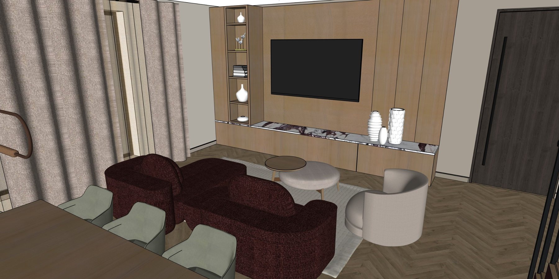 Living room with curved sofa, round ottoman and oak media wall